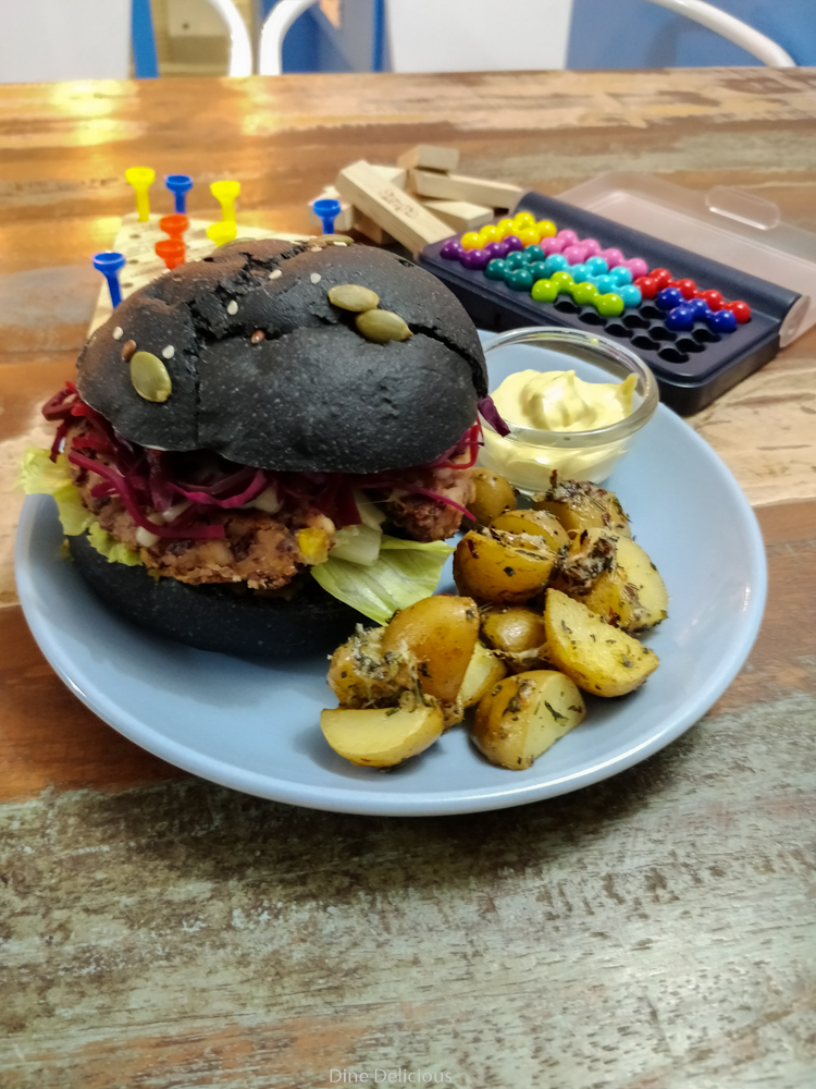Charcoal burger in bean patty